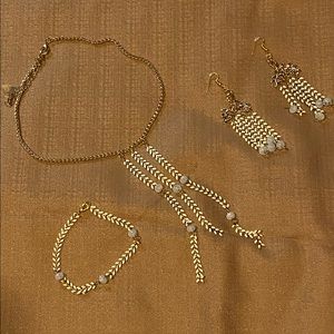 Leafy white and gold necklace, earrings, and bracelet set